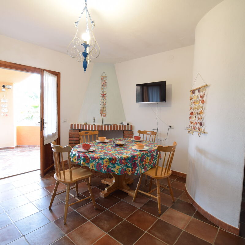 Appartamento Faro In Budoni: Autumn, Dining Room, Living Room, Spring, Summer, Winter