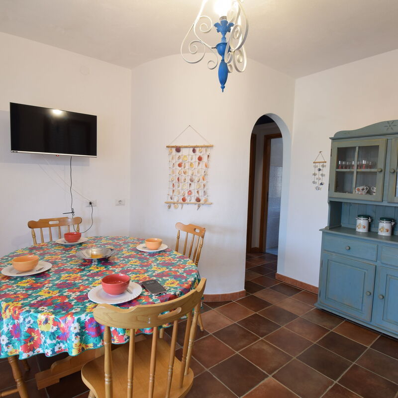 Appartamento Faro In Budoni: Autumn, Dining Room, Living Room, Spring, Summer, Winter